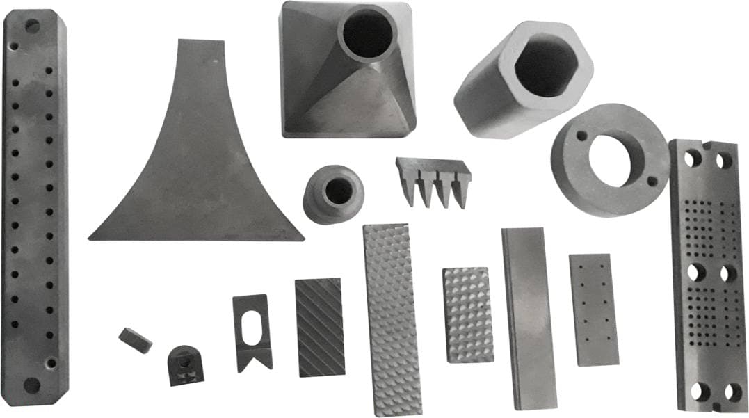 Custom tungsten carbide wear plates, nozzles and components